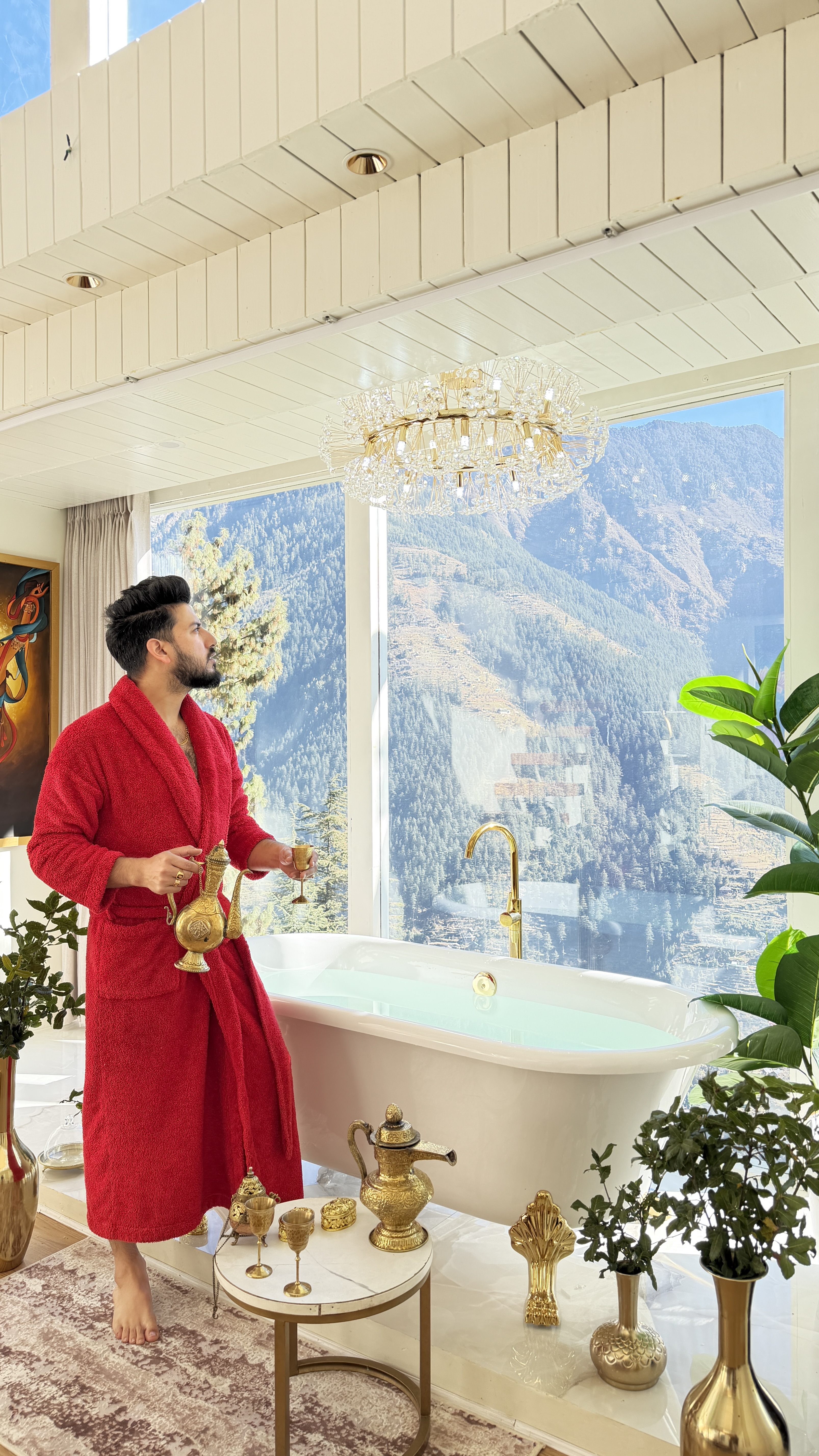 bathtub with a view of the misty valley at sunrise